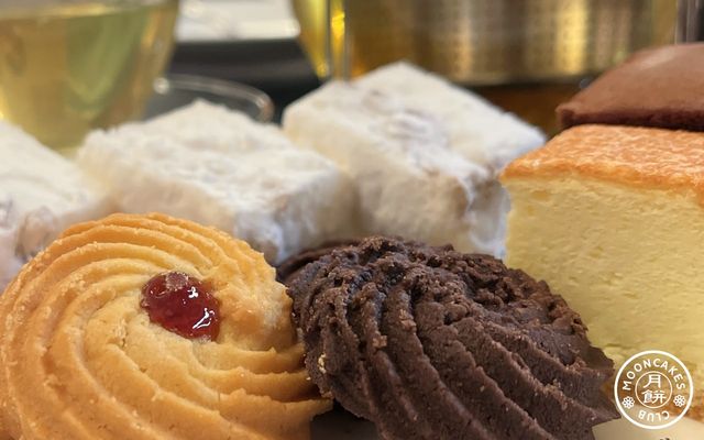 A small plate of cookies, cakes, and zefir